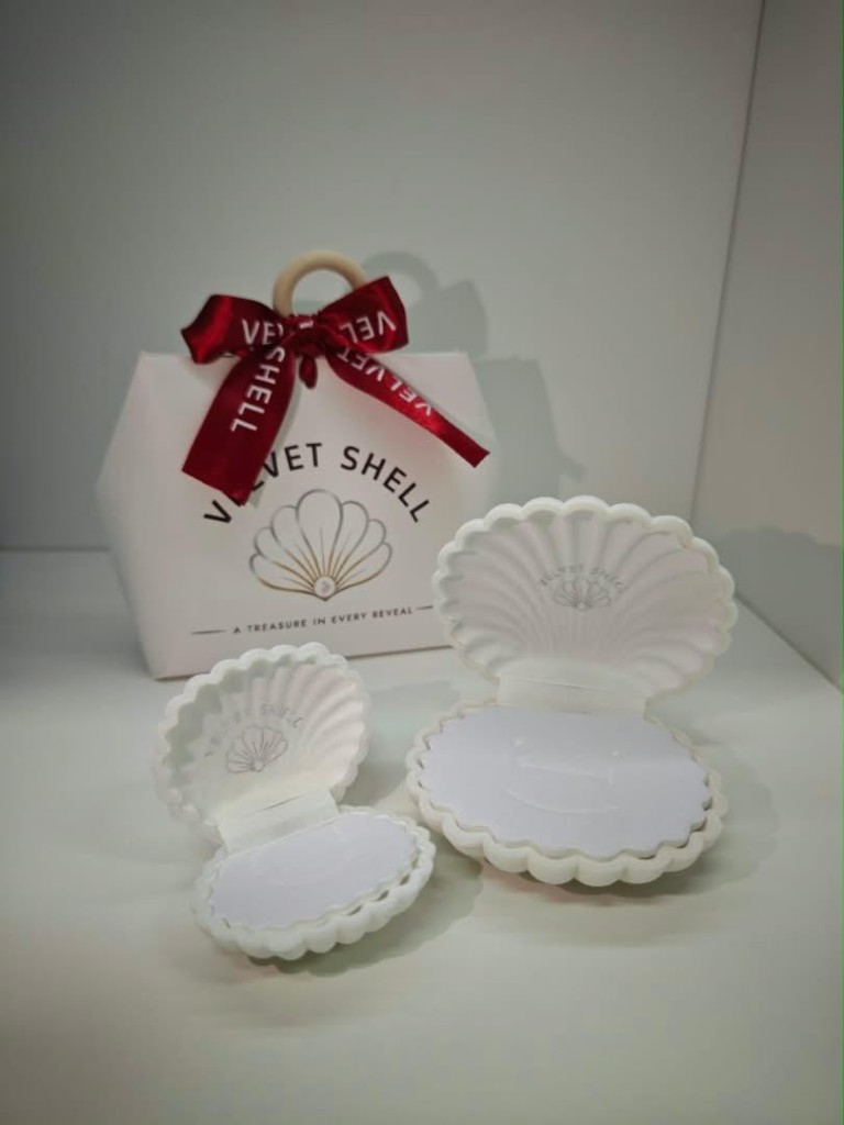 Velvet Shell gift bag with burgundy ribbon and open shell jewellery cases